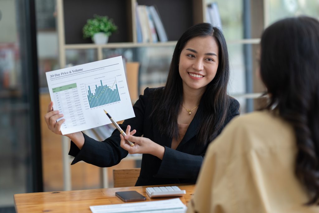 Picture of a woman using Truth Concepts Financial Software for Financial Advisors to advisor a client